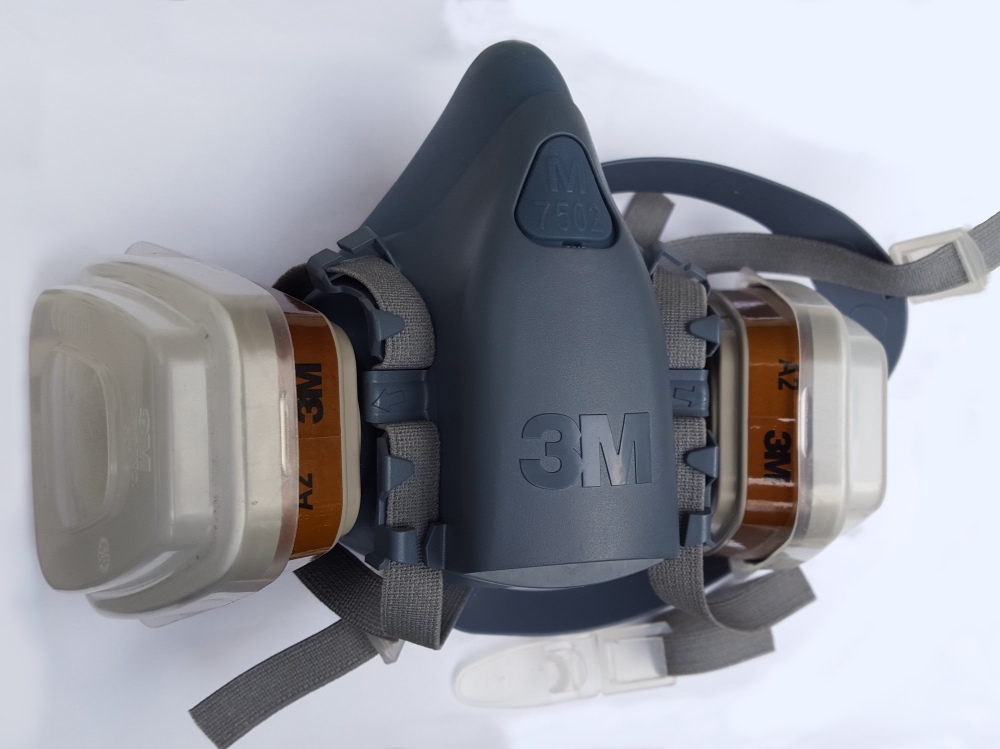 This is a Respirator fitted with two disposable cartridges and two disposable paper filters clipped onto those - this worked where the disposable paper dust masks totally failed to keep the noxious Duo2 soldering fumes in check - you have been warned!